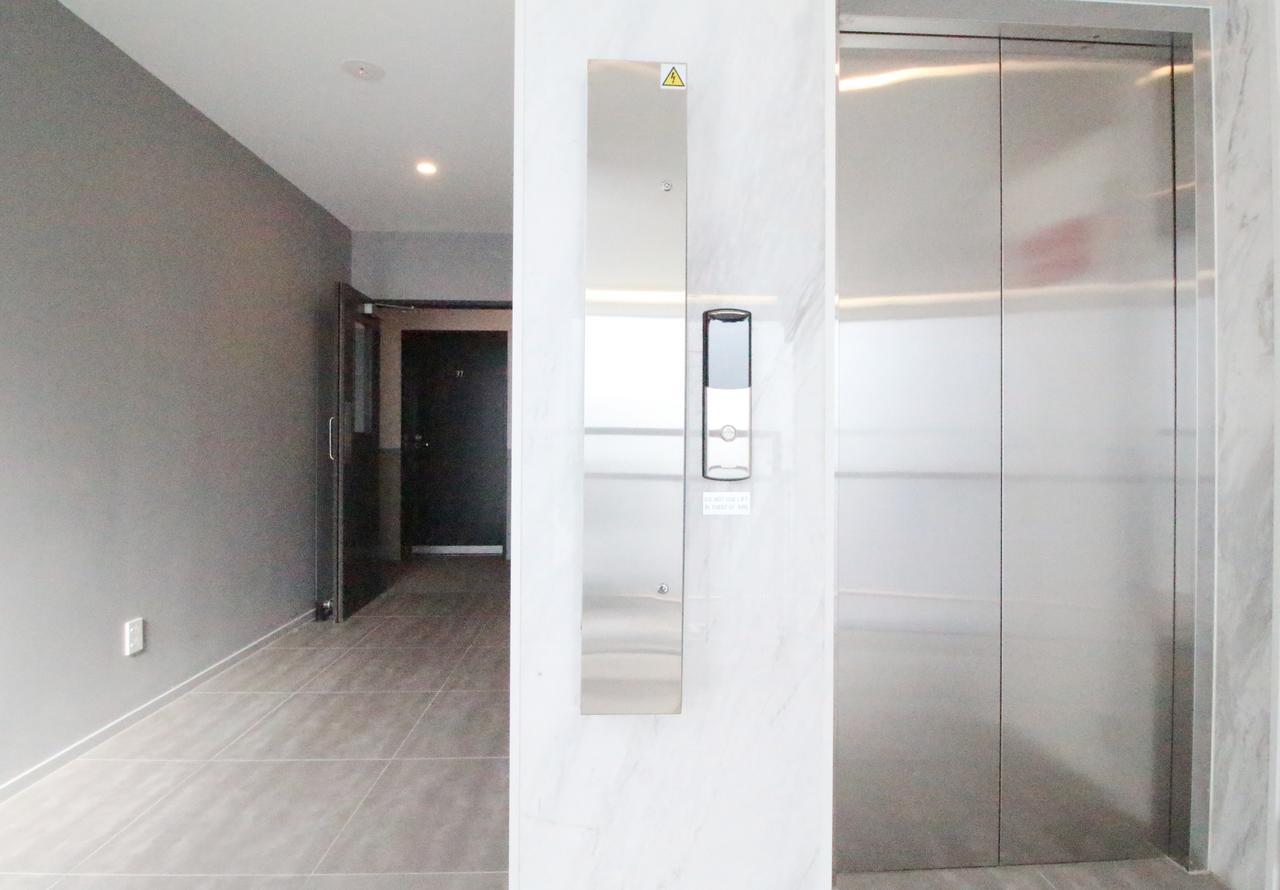 Fernz Motel & Apartments Birkenhead Auckland Extérieur photo A residential elevator